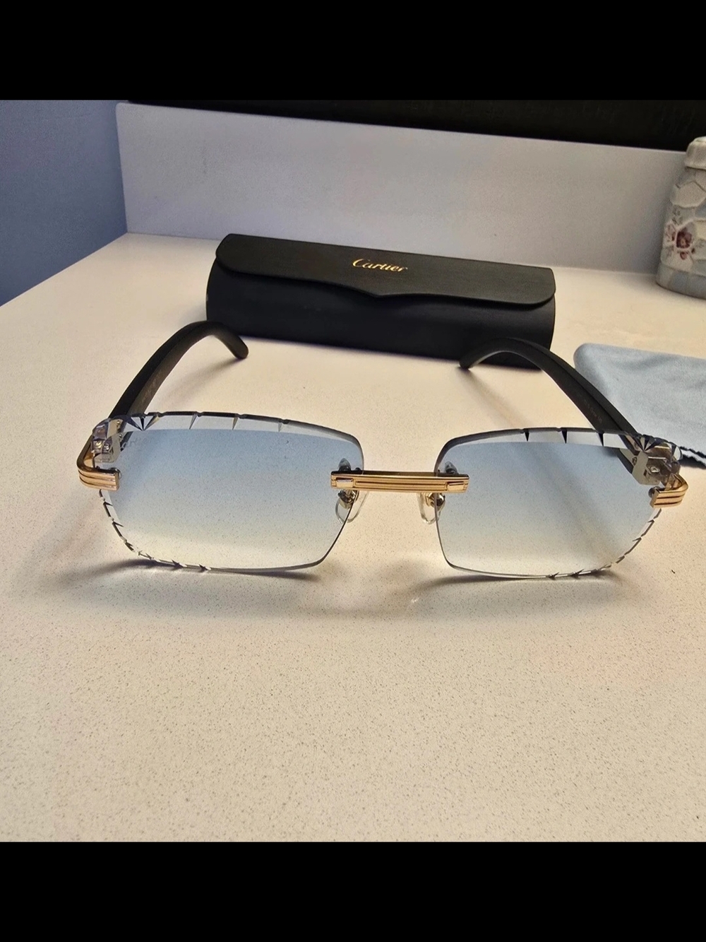 Cartier Rimless Sunglasses with Blue Gradient Lenses